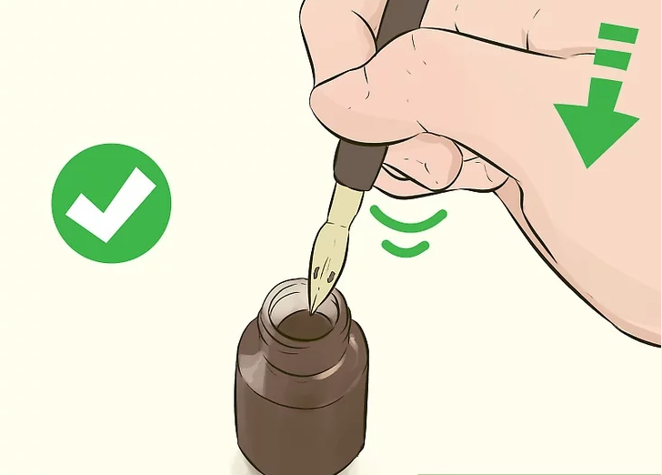 Dip the Pen Nib in Ink and Shake Off Excess