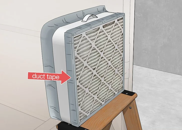 Tape a Furnace Filter to the Back of the Fan